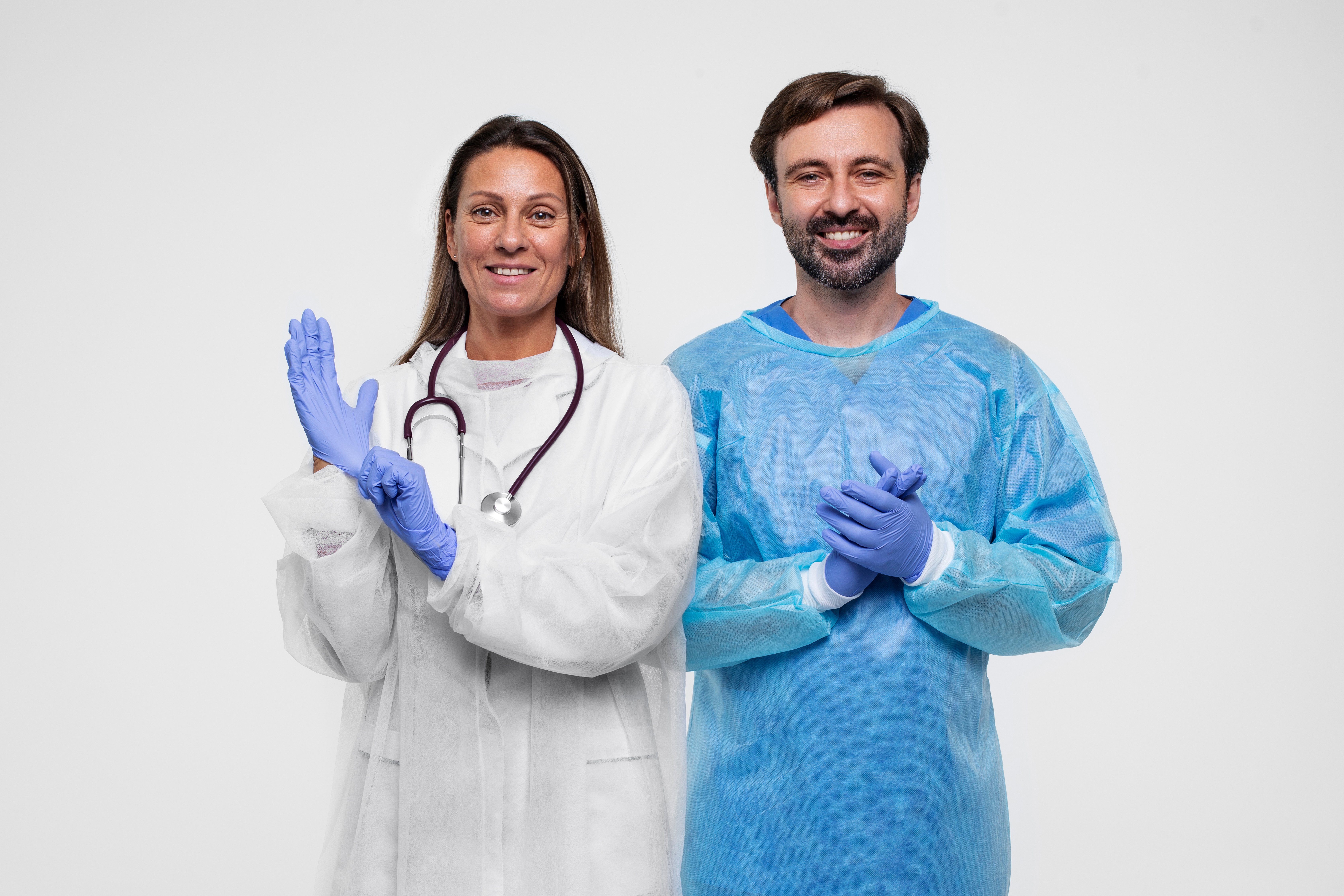 portrait-man-woman-wearing-medical-gowns